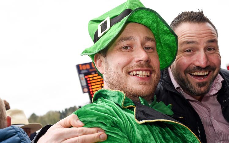 Two race goers enjoying the Midlands Grand National and St Patricks Day